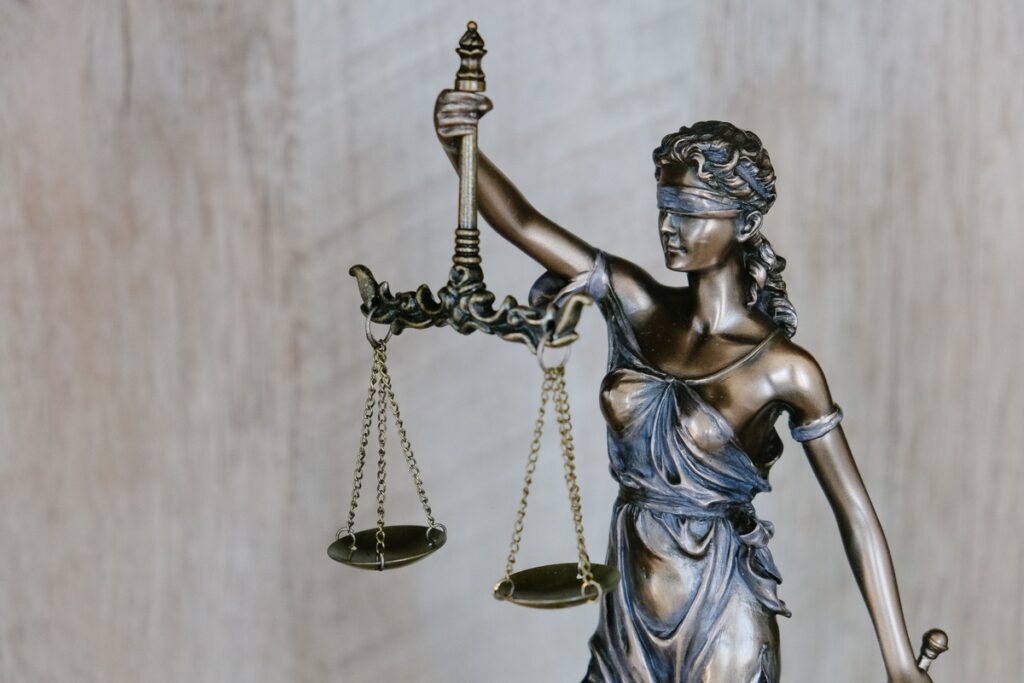 statue-woman-holding-scales-justice